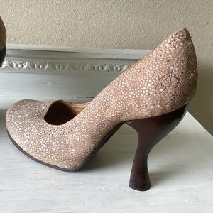 John Fluevog neutral heels. Well padded interior.